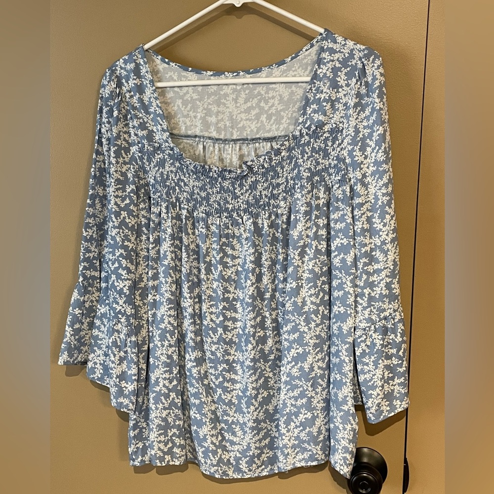 Super cute and versatile blouse.